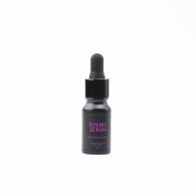 Butelka olejowego serum Divine do masażu twarzy w kolorze czarnym z różowymi napisami marki Easy Livin